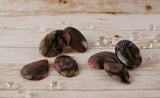 Rhodonite In Quartz Cabochons