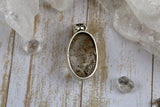 Rutilated Quartz In Sterling Silver Pendant