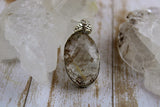 Rutilated Quartz In Sterling Silver Pendant